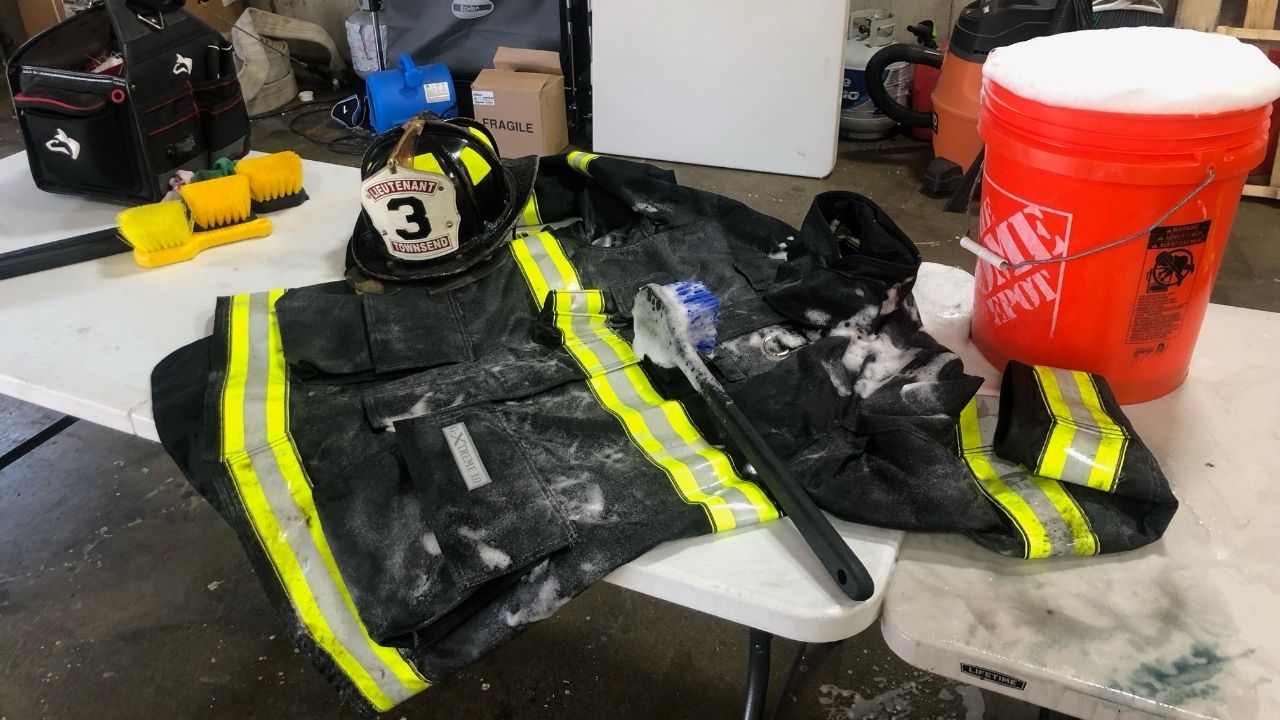 Firefighters jacket being cleaned by Redline Gear Cleaning